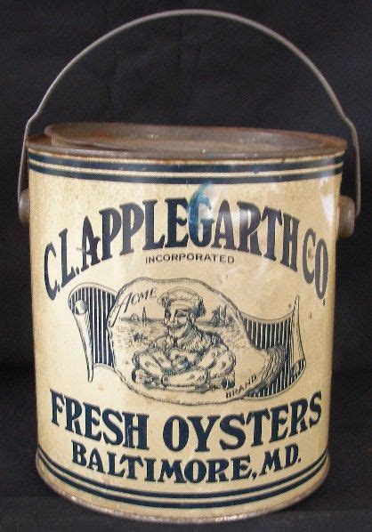 old metal tin that went around the house|antique oyster tins.